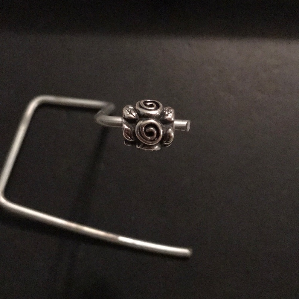 Retired sterling silver flower charm